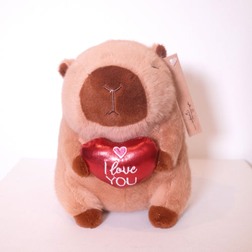 Cuddly capybara soft toy holding an "I love you" heart, gift with flowers Sydney — Hanaya Flora
