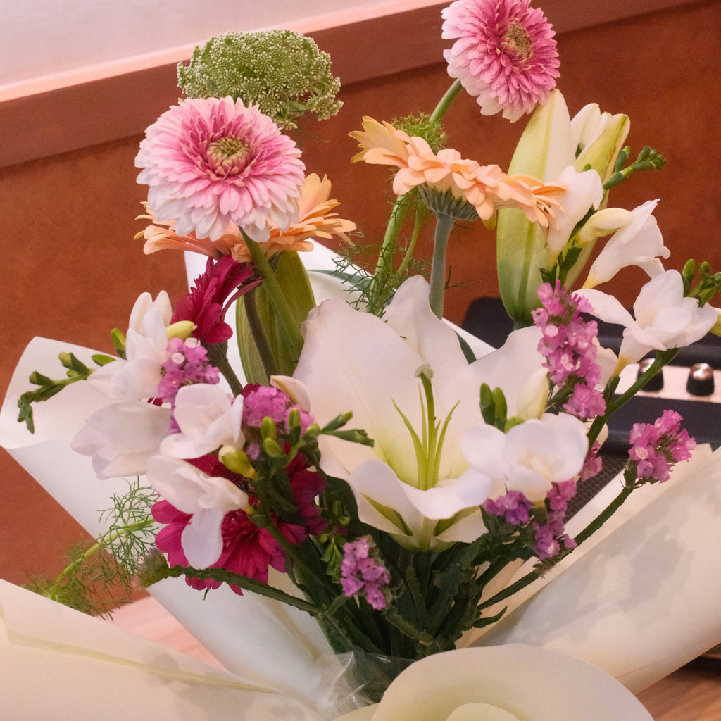 Close-up of Yume Melody bouquet with pink gerbera, lilies and freesia