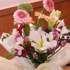 Close-up of Yume Melody bouquet with pink gerbera, lilies and freesia