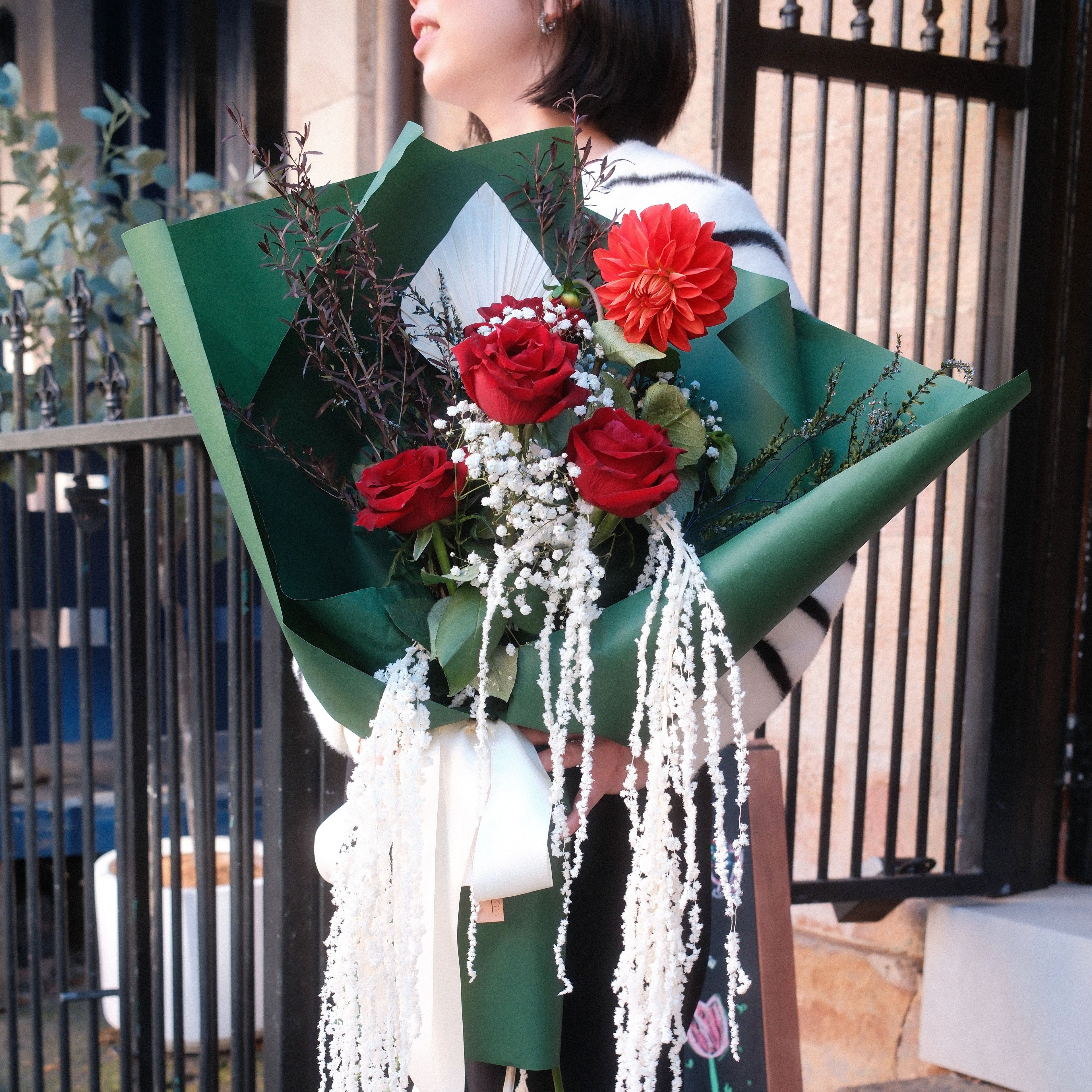 Crimson Cascade bouquet with trailing preserved amaranthus, Surry Hills florist Hanaya Flora