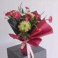 Bouquet of flowers with pink and green colors wrapped in modern styl, perfect gift for mum made by Hanaya Flora, Sydney, Surry Hills