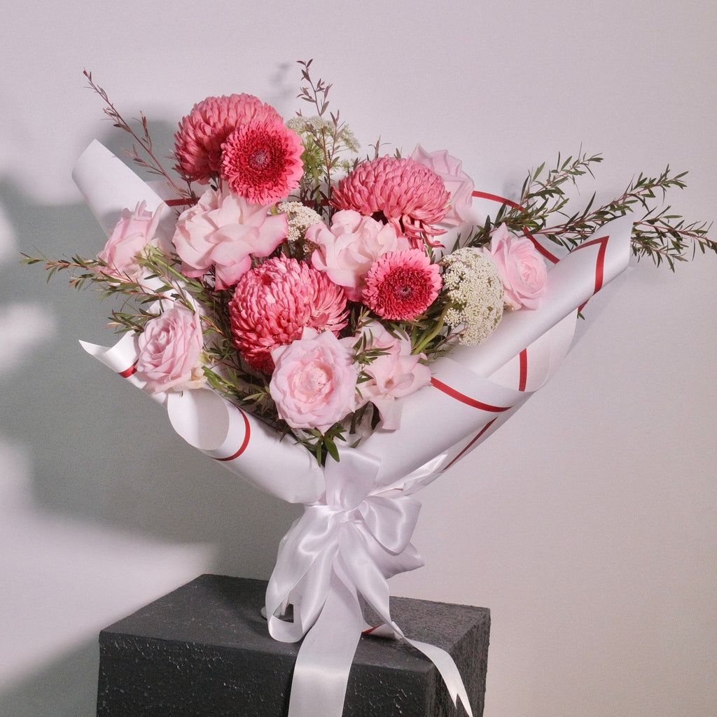 Pink rose and chrysanthemum bouquet for mum, styled on a pedestal, Surry Hills flower shop