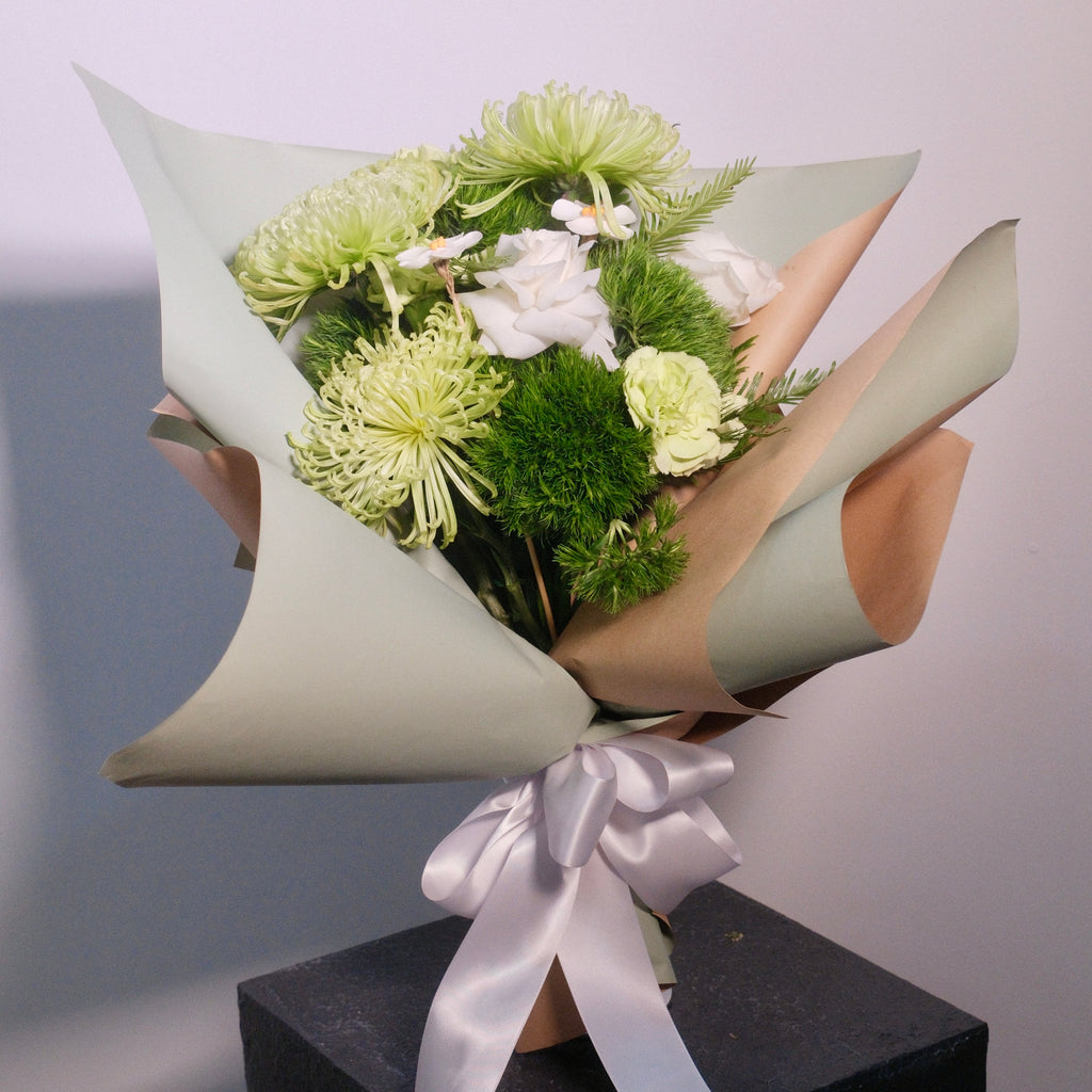 Gift the Wakaba Graduation Bouquet – crisp white & lush green blooms perfect for graduation, spring celebrations, and congratulating achievements, by Hanaya Flora, based in Sydney.