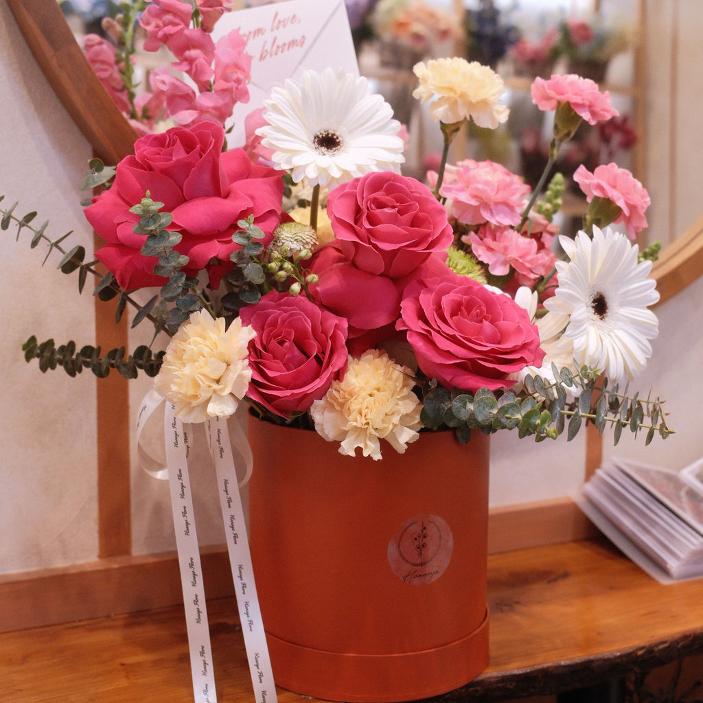 Hanaya Box Vivid flower box with pink roses and gerberas in a terracotta hat box, Sydney