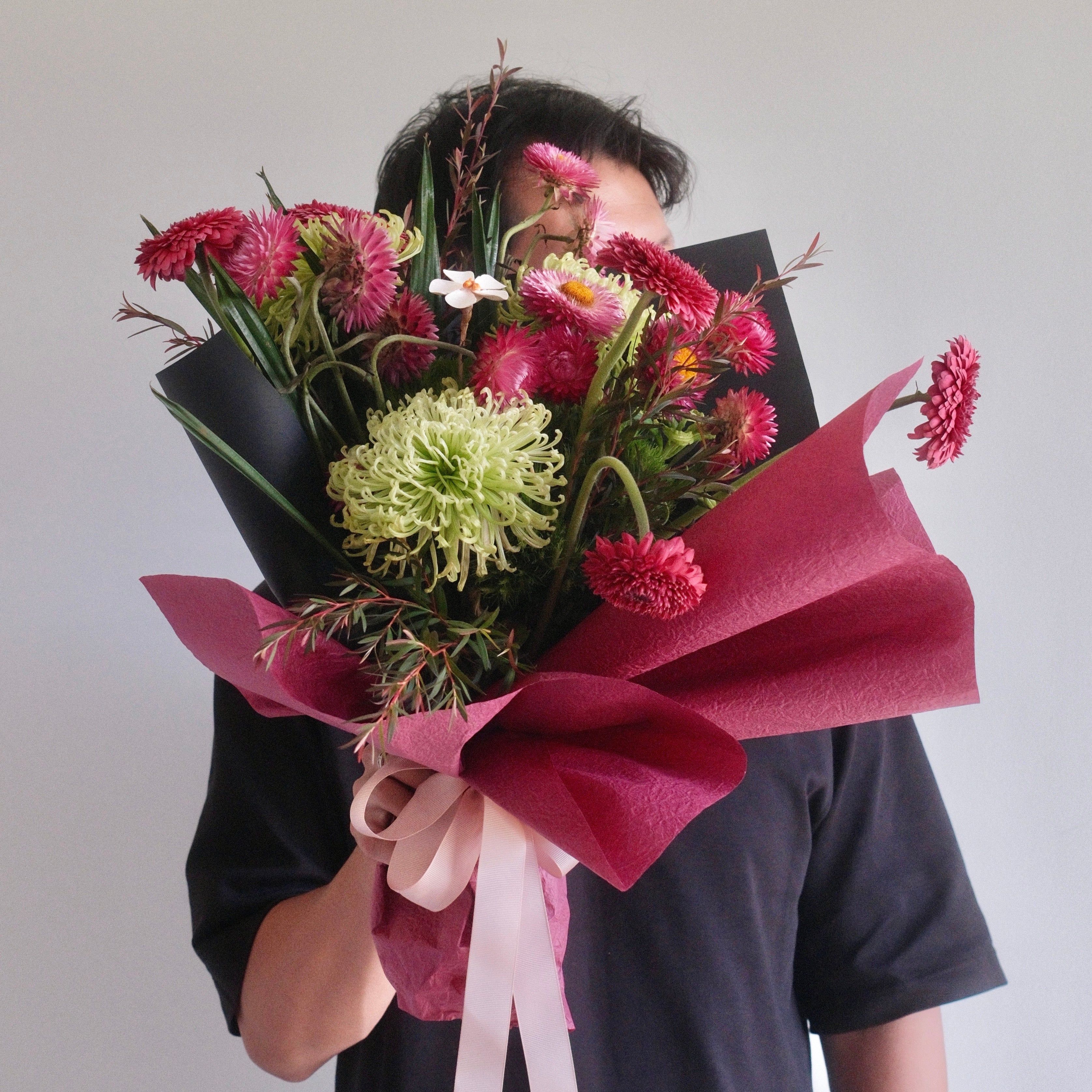 Bouquet of flowers with pink and green colors wrapped in modern styl, perfect gift for mum made by Hanaya Flora, Sydney, Surry Hills.