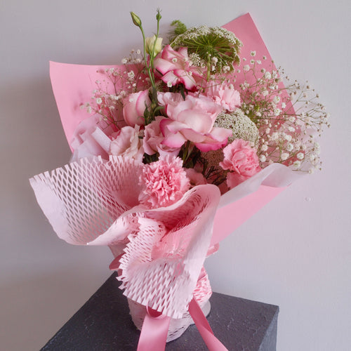 Blossom Pride graduation Bouquet – a thoughtful pink graduation gift celebrating growth, accomplishment, and bright futures for graduates, by Hanaya Flora, Sydney.