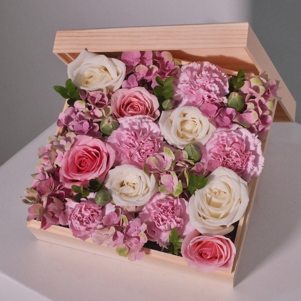 Wooden gift box filled with pink roses and white rose flowers, by Hanaya Flora, Sydney Flowers.