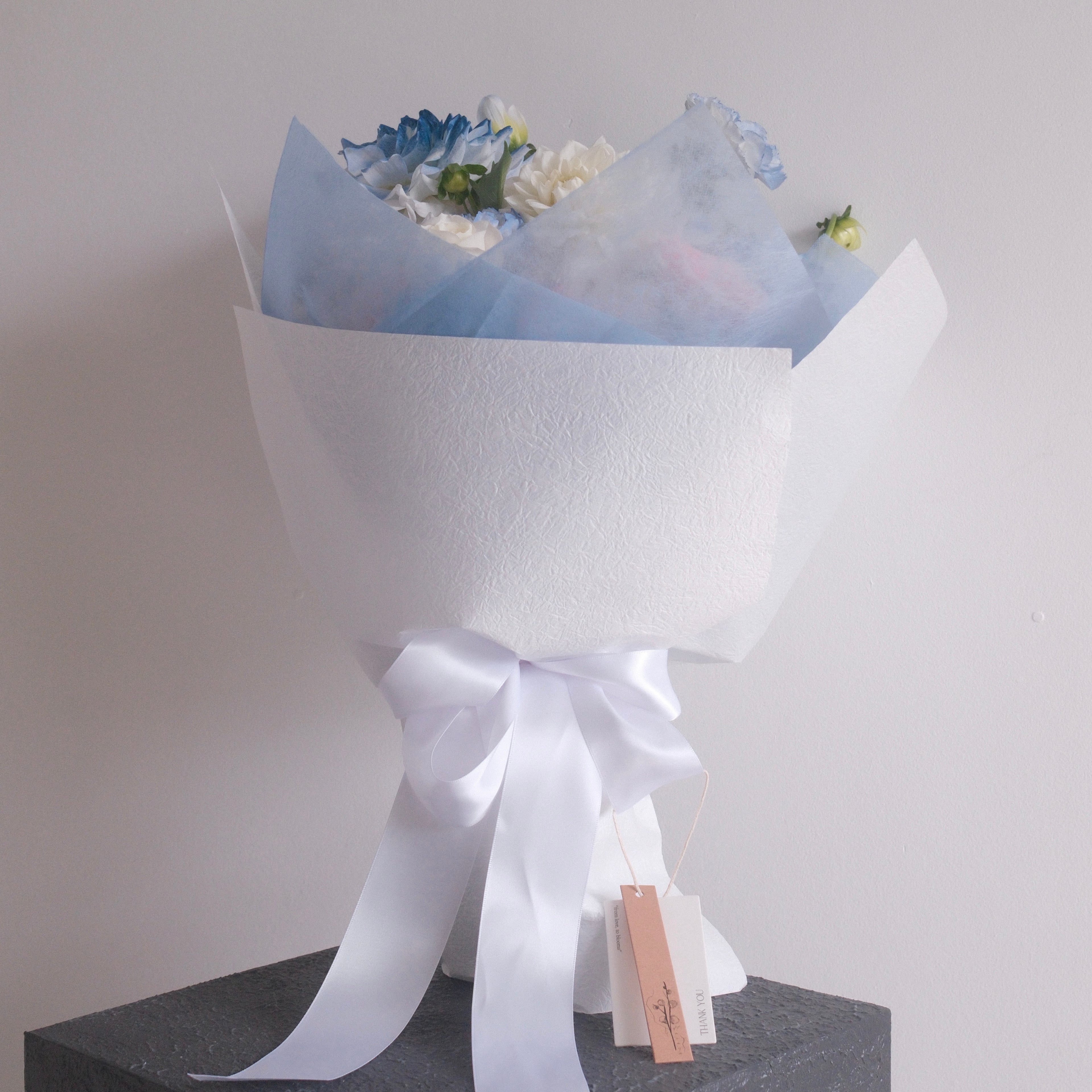 Sky Muse pastel bouquet styled on a pedestal, a birthday and thank you gift, Sydney