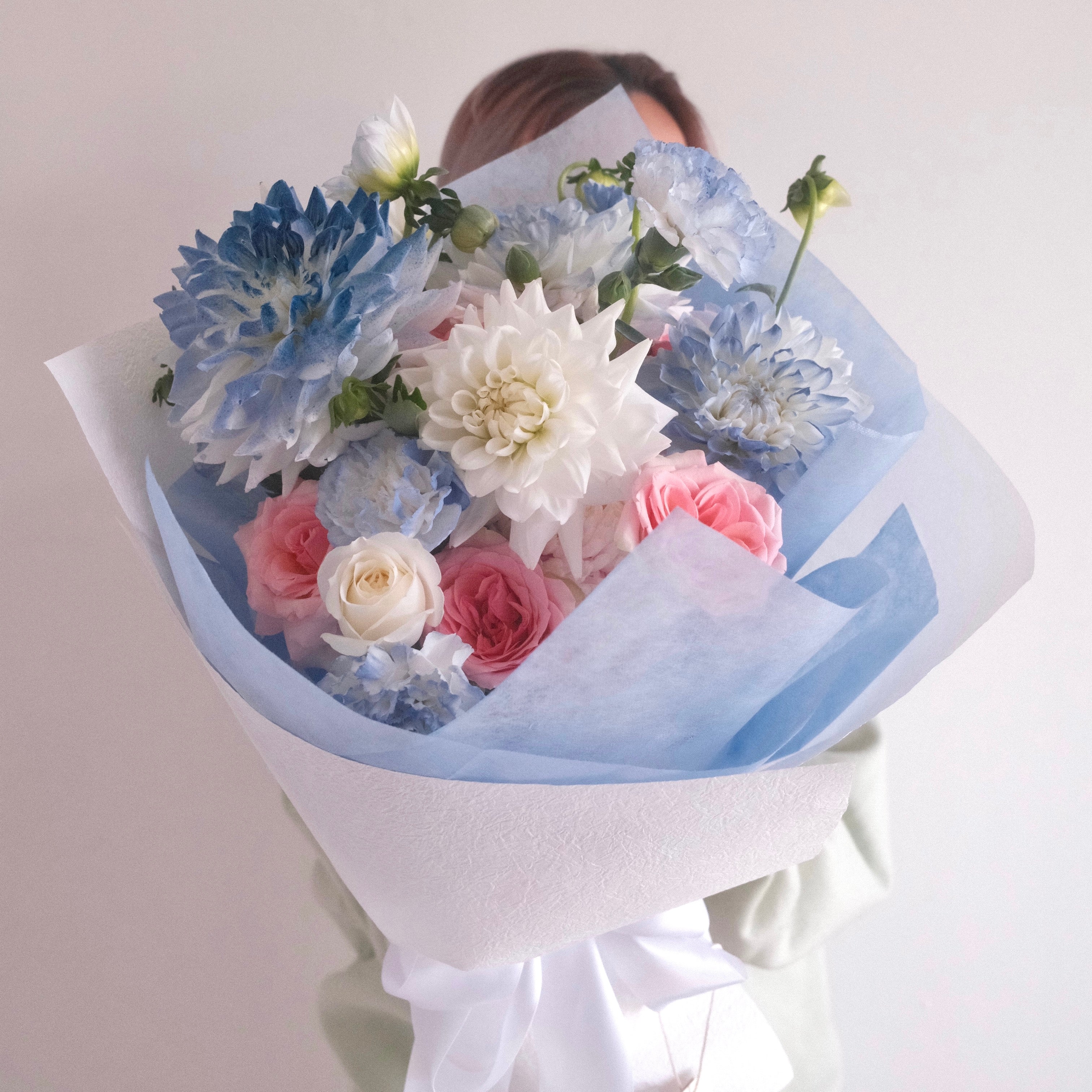 Close-up detail of the Sky Muse bouquet with dahlias and roses, Sydney