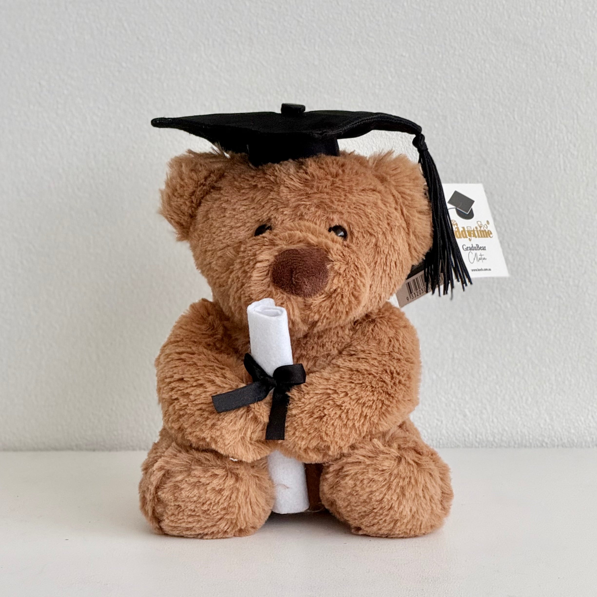 Graduation-themed teddy bear with a cap and diploma for graduation gift, Hanaya Flora, Surry Hills, Sydney.