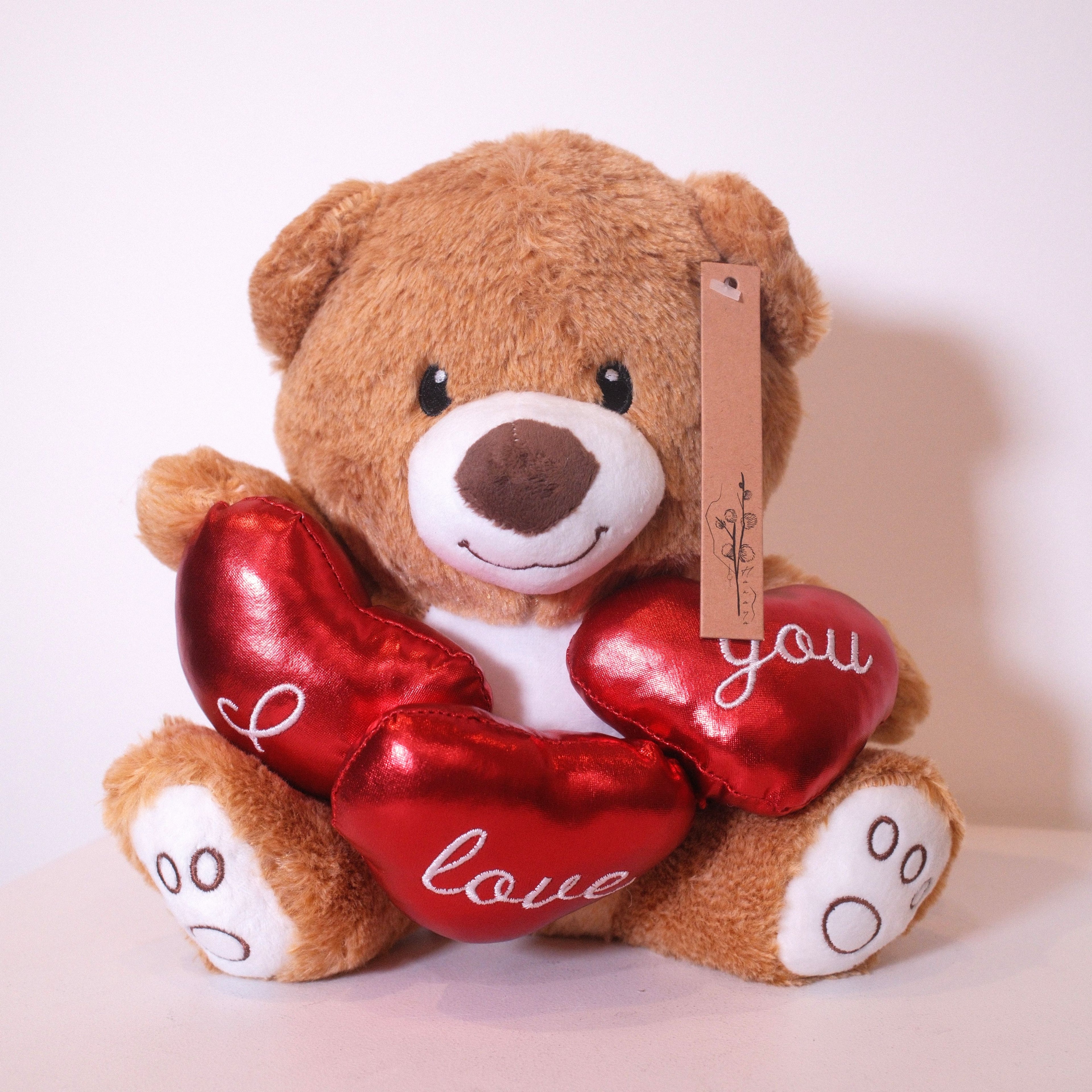 Tan teddy bear Teo 25cm holding three "I Love You" hearts, soft toy gift Sydney — Hanaya Flora